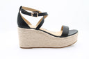 Sandales compensées noires Michael Kors Serena Wedge en cuir avec bride ajustable et semelle en corde
